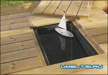 песочница с водоемом