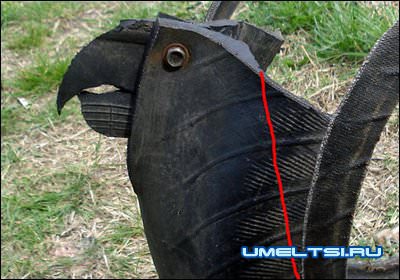 Попугай из покрышки